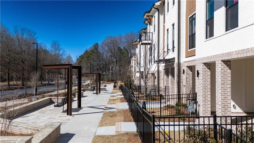 362 Olmstead Way, Unit 23 Alpharetta, GA 30022 - Photo 34 of 43 a view of a building with sitting area