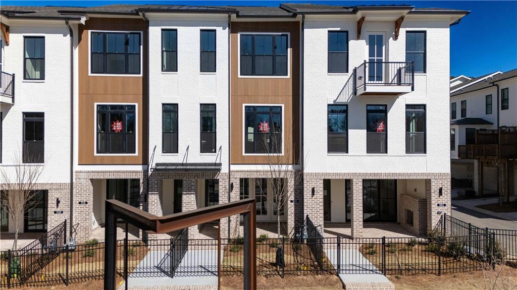 362 Olmstead Way, Unit 23 Alpharetta, GA 30022 - Photo 35 of 43 a building view with a outdoor space