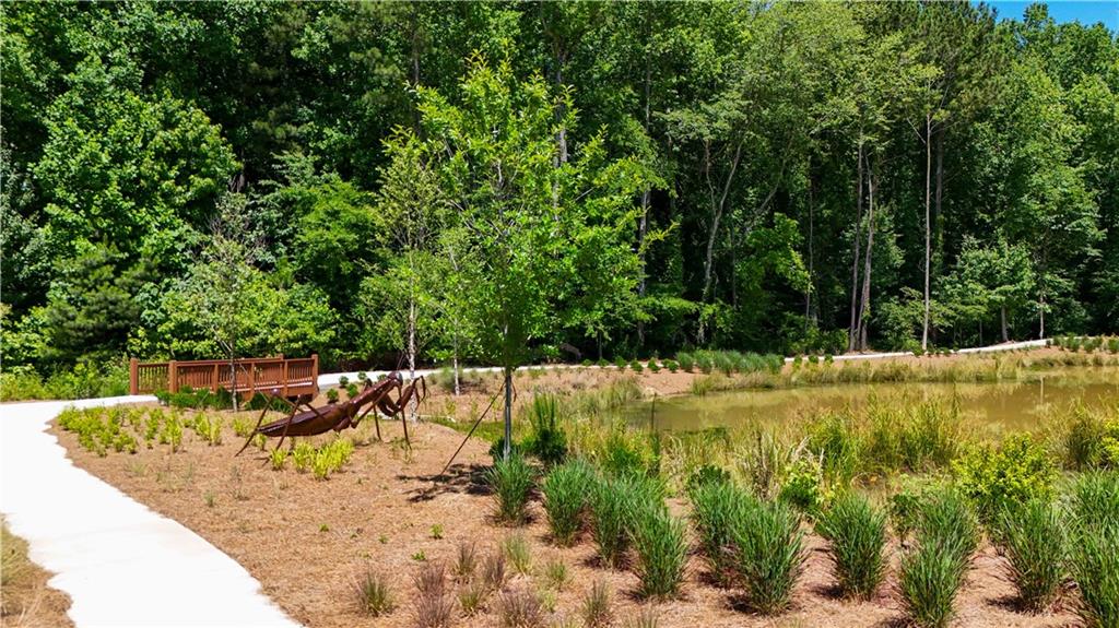 362 Olmstead Way, Unit 23 Alpharetta, GA 30022 - Photo 37 of 43 a view of a yard with large trees