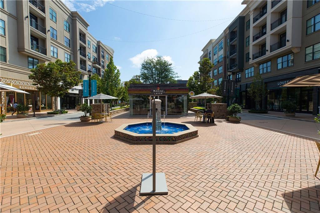 362 Olmstead Way, Unit 23 Alpharetta, GA 30022 - Photo 41 of 43 a view of a building with sitting area