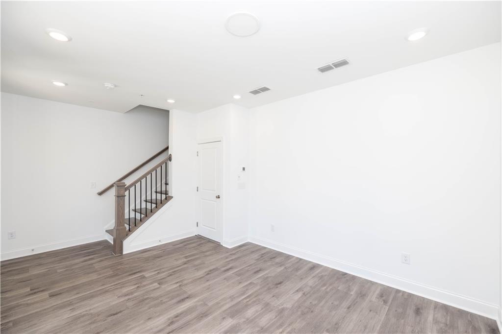 362 Olmstead Way, Unit 23 Alpharetta, GA 30022 - Photo 5 of 43 a view of entryway with wooden floor