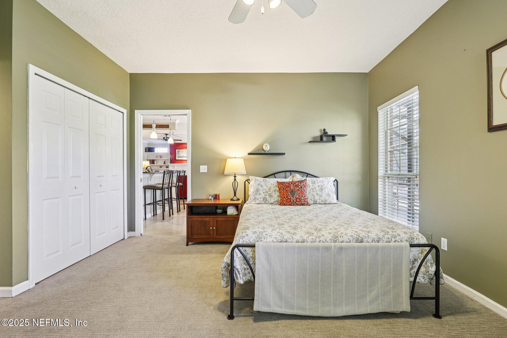 1432 Course View Drive Fleming Island, FL 32003 - Photo 14 of 83 a living room with a couch and a table