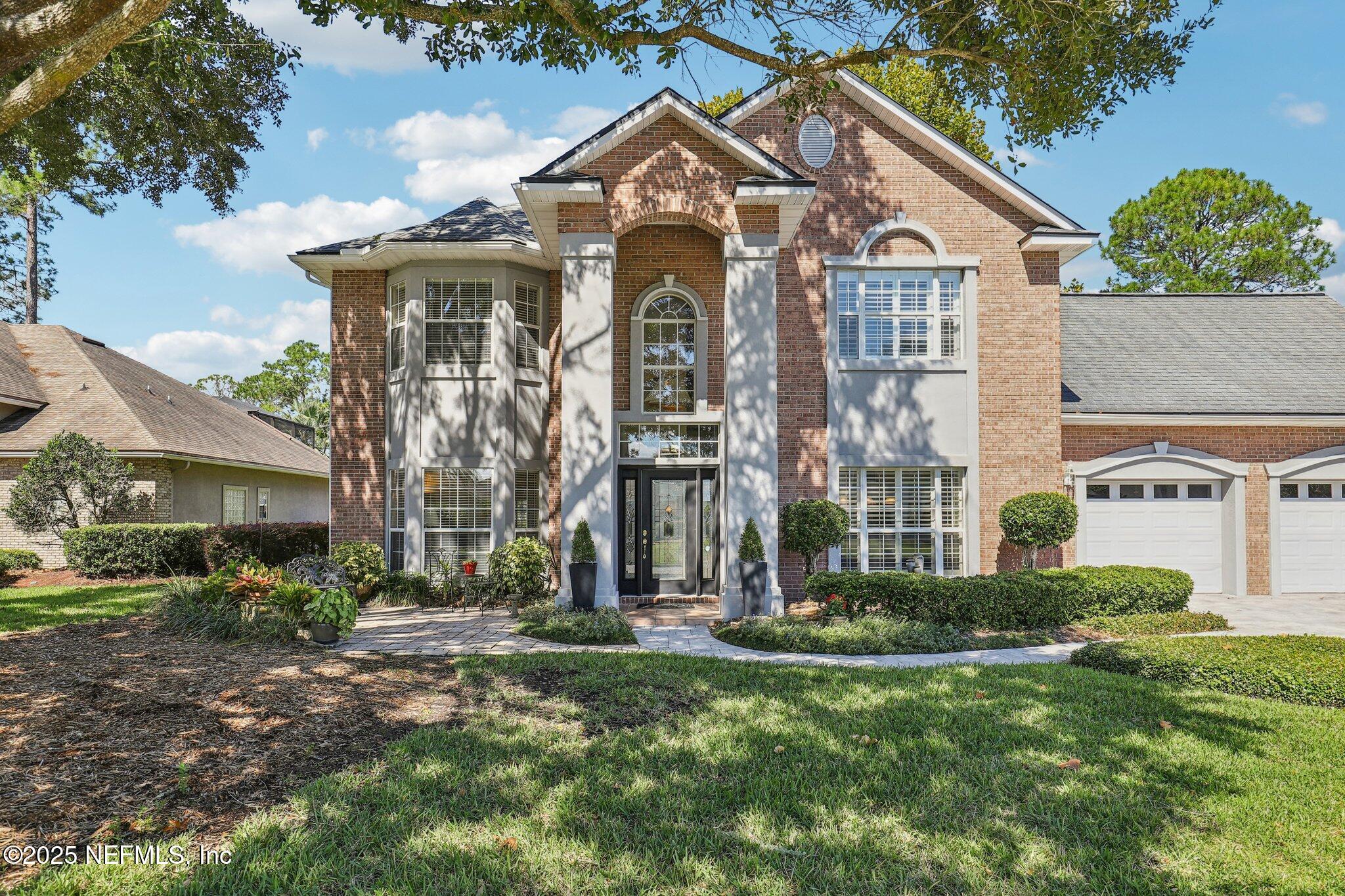 1432 Course View Drive Fleming Island, FL 32003 - Photo 20 of 83 a front view of a house with a yard