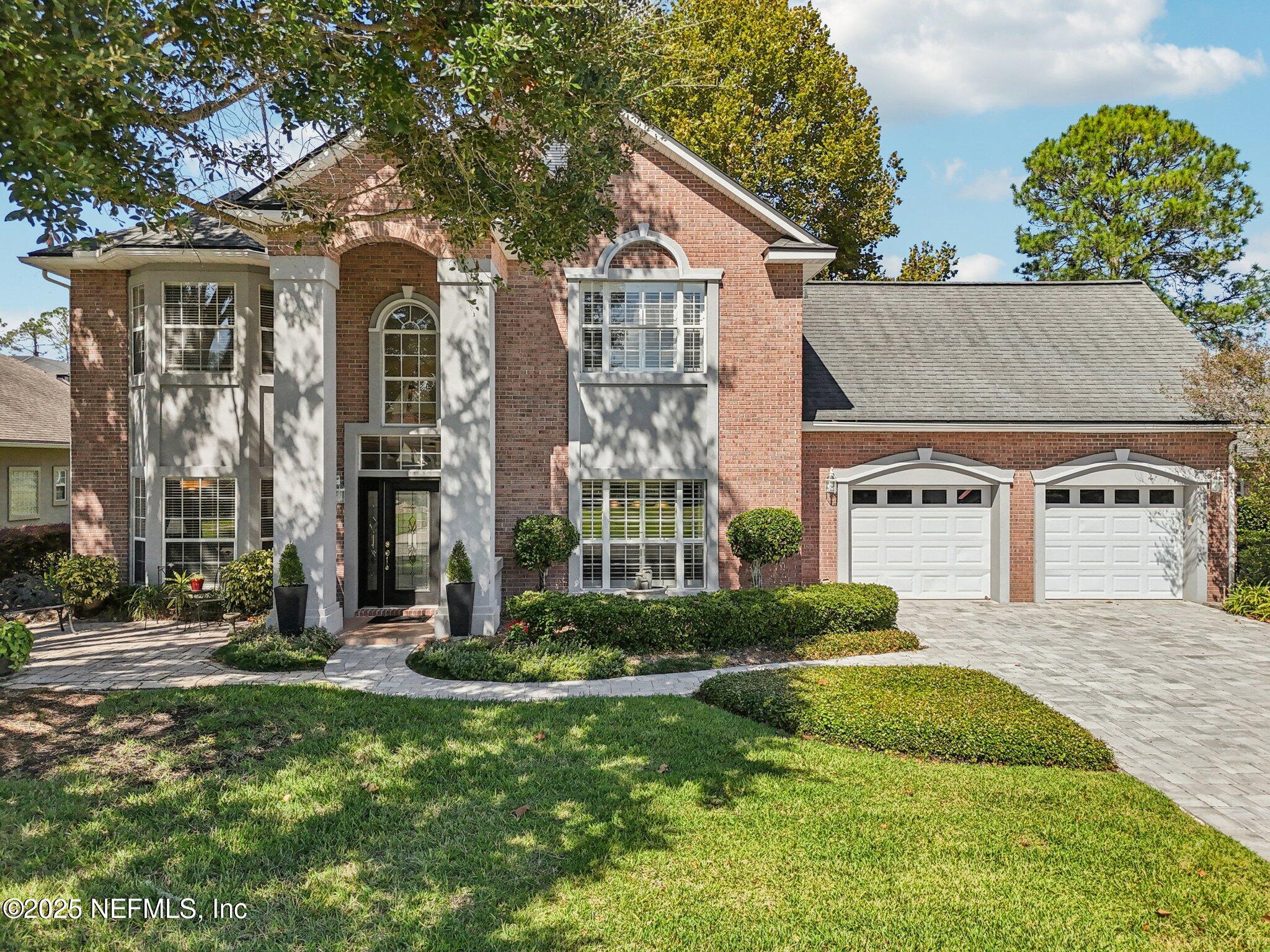 1432 Course View Drive Fleming Island, FL 32003 - Photo 2 of 83 a view of outdoor space yard and front view of a house
