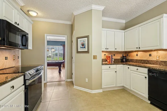 a bath tub sitting in a bathroom next to a window