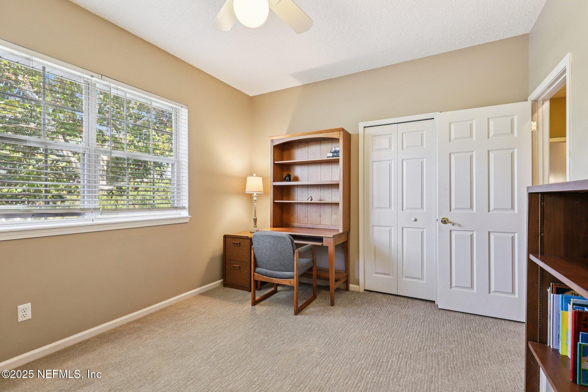 1432 Course View Drive Fleming Island, FL 32003 - Photo 37 of 83 a view of a livingroom with furniture and a window