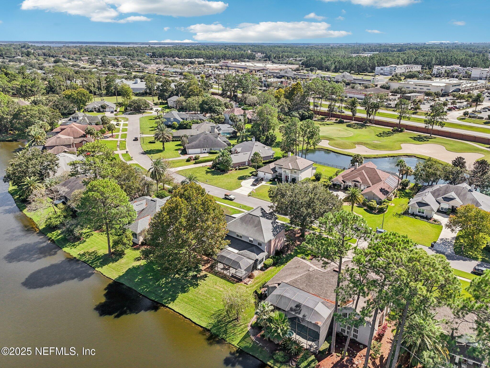 1432 Course View Drive Fleming Island, FL 32003 - Photo 64 of 83 an aerial view of residential houses with outdoor space