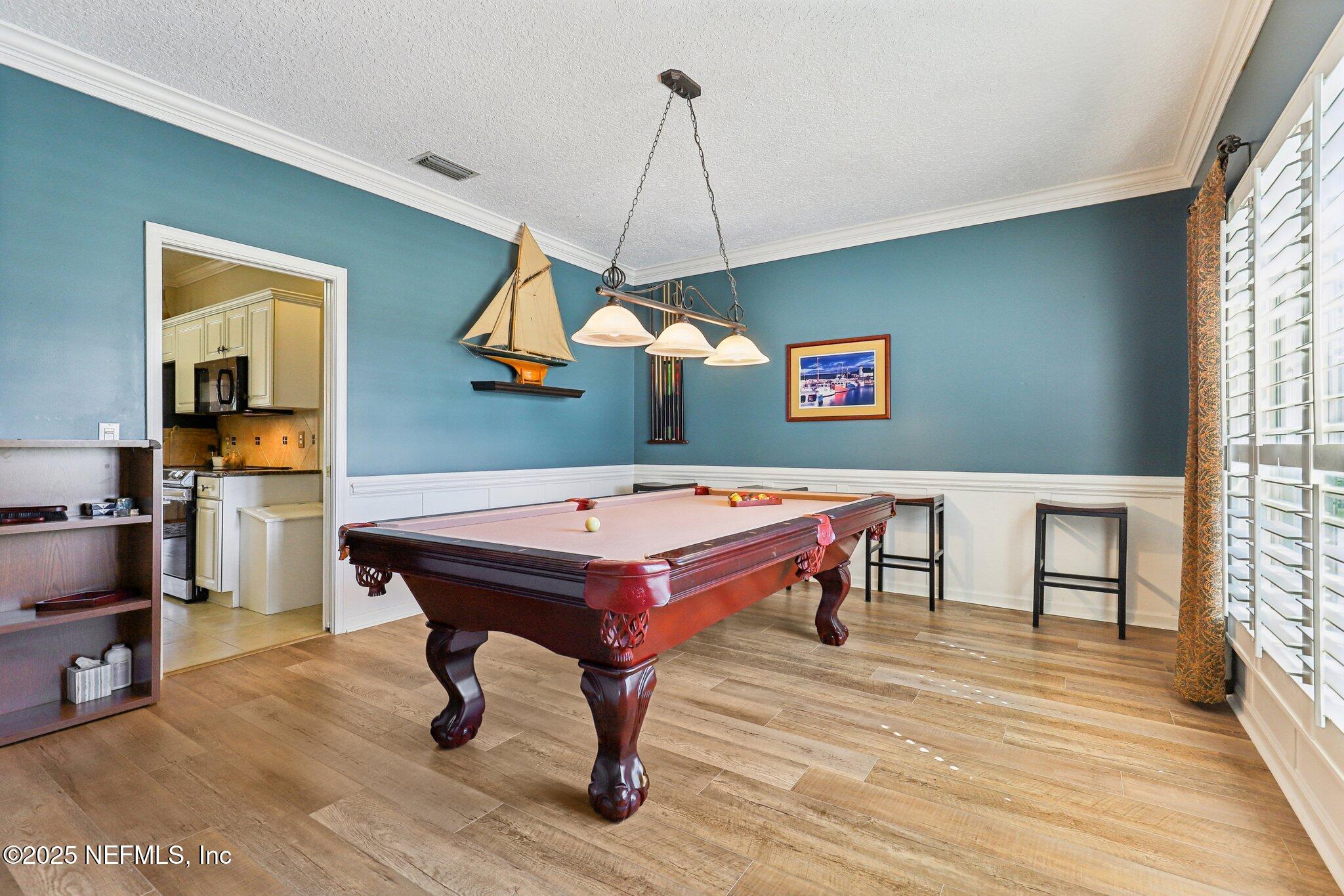 1432 Course View Drive Fleming Island, FL 32003 - Photo 7 of 83 a room with pool table and windows
