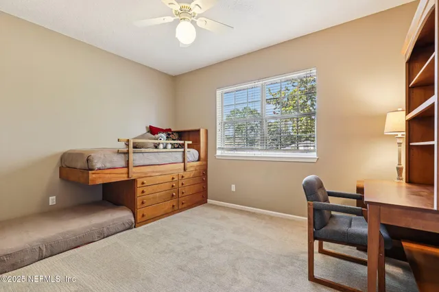 a living room with a couch and a table