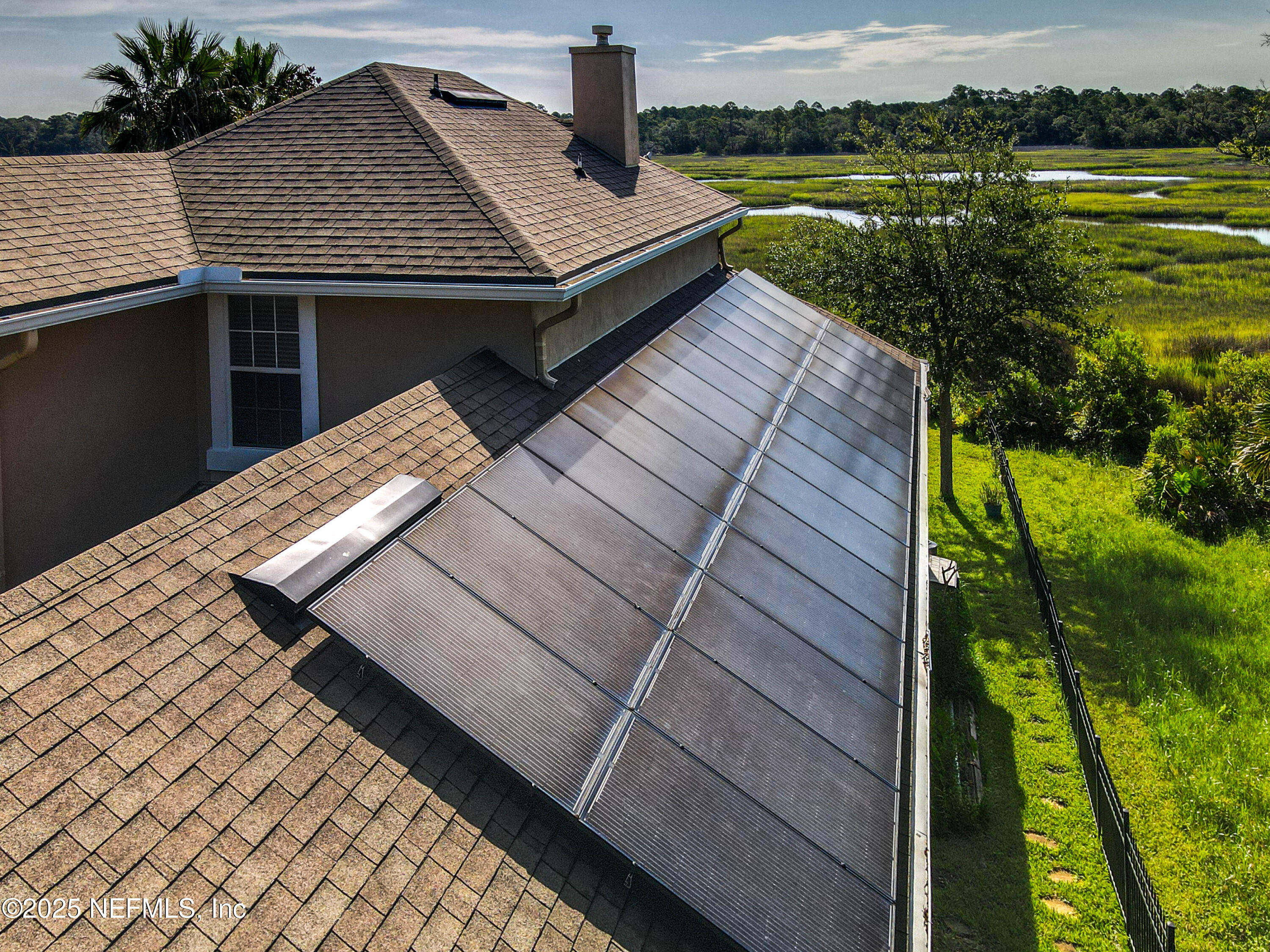 96218 Windsor Drive Yulee, FL 32097 - Photo 14 of 53 a view of a house with a yard