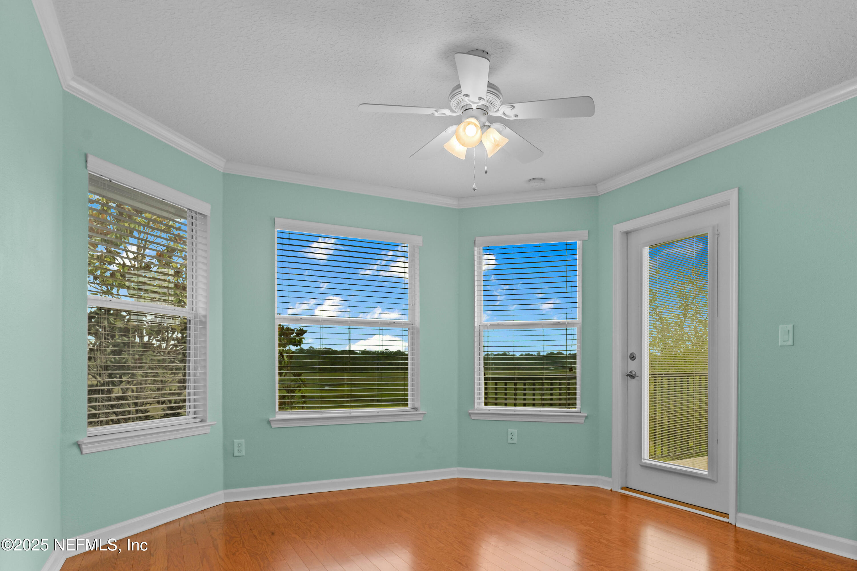 96218 Windsor Drive Yulee, FL 32097 - Photo 26 of 53 a view of an empty room with a window