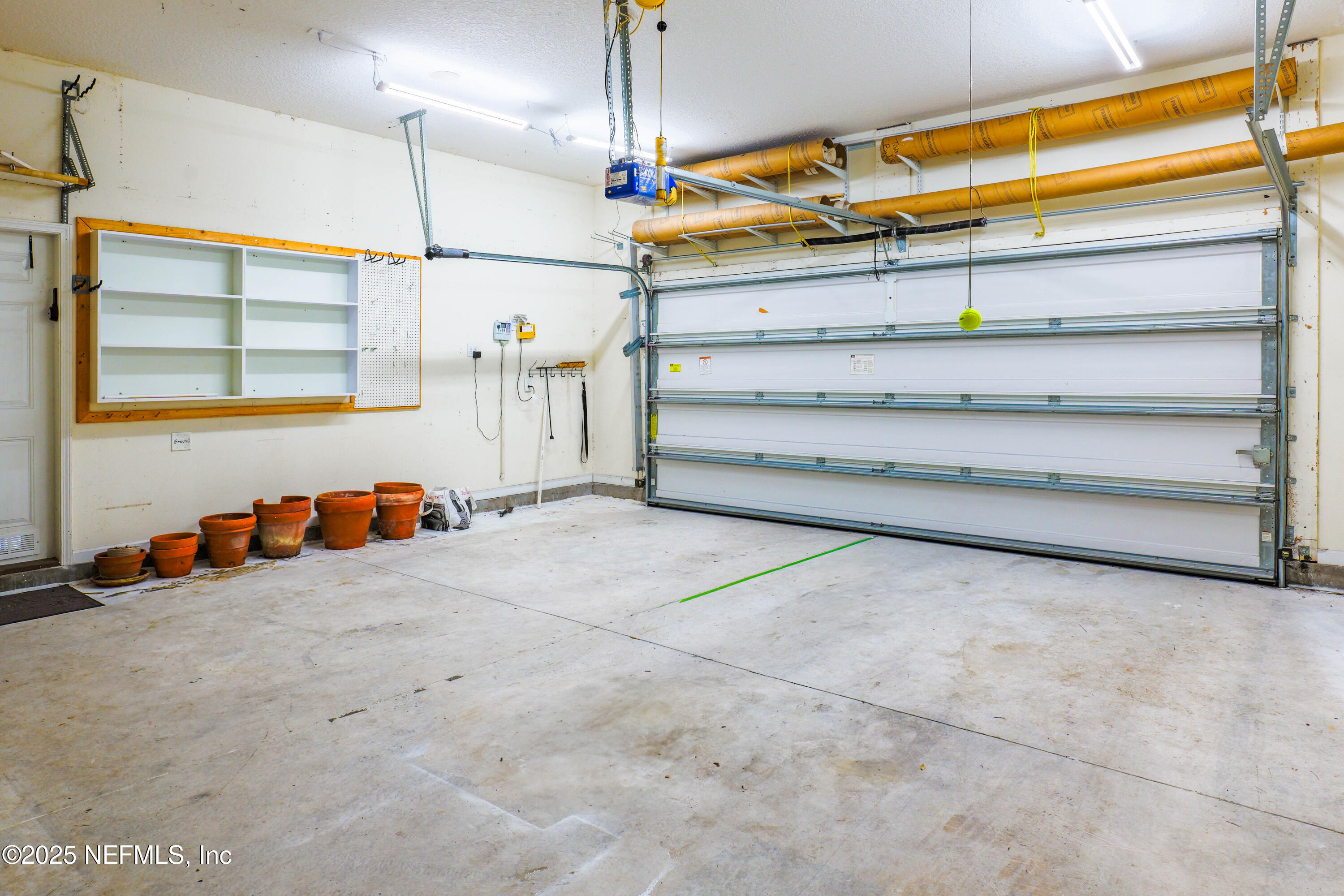 96218 Windsor Drive Yulee, FL 32097 - Photo 27 of 53 a view of storage and utility room