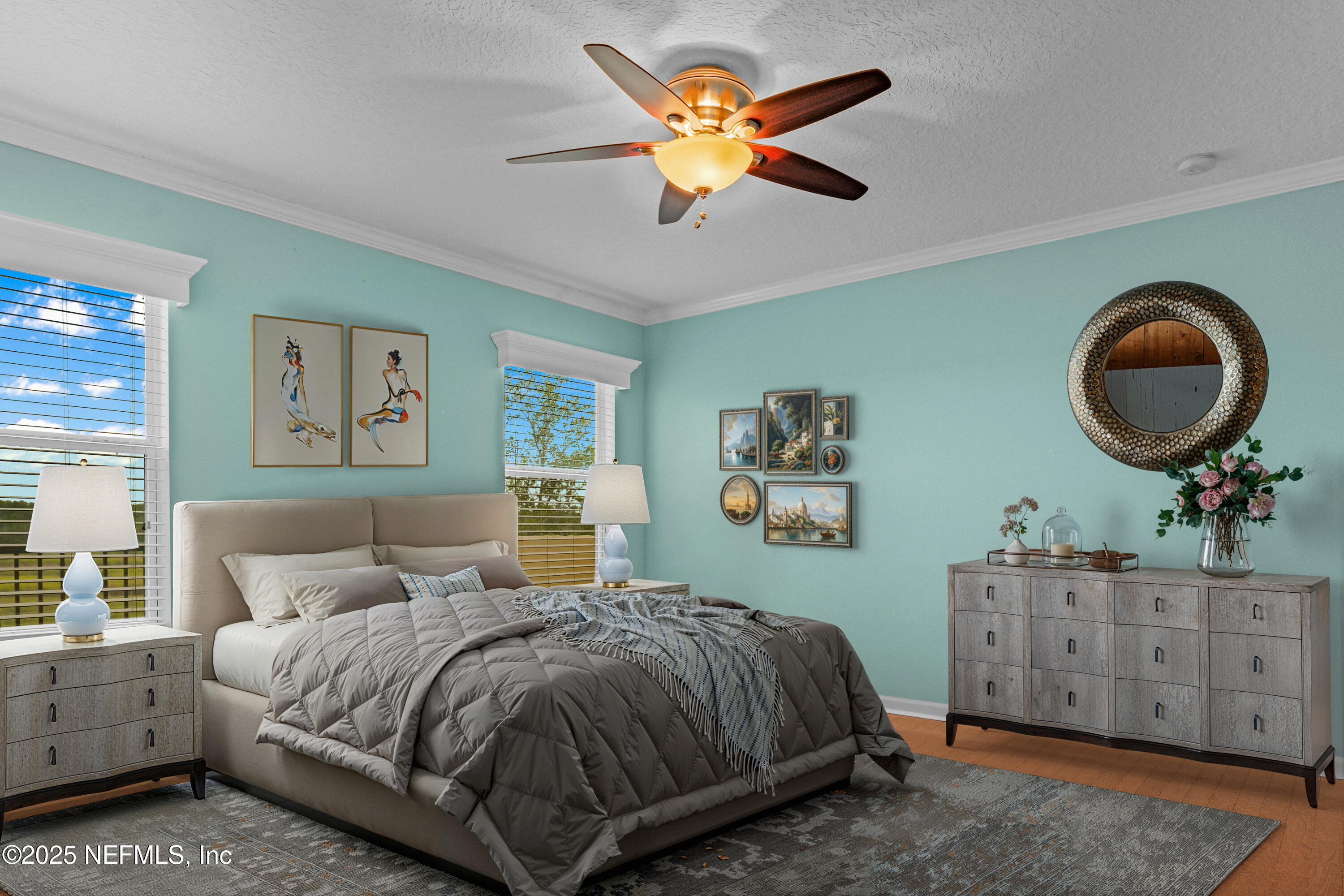 96218 Windsor Drive Yulee, FL 32097 - Photo 36 of 53 a bedroom with a bed and a painting on the wall