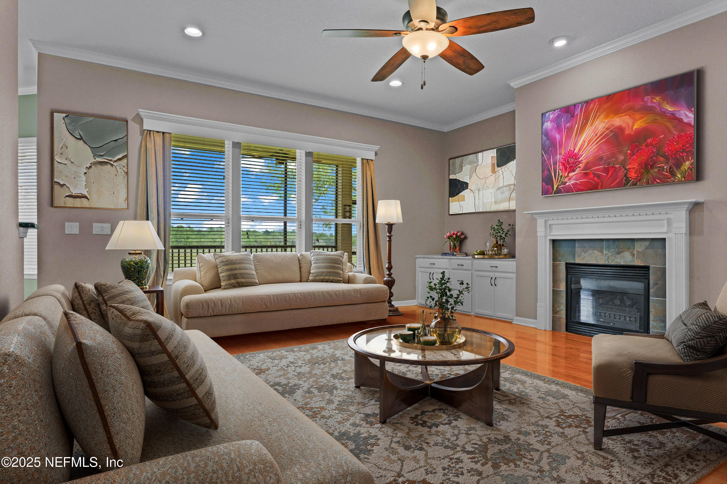 96218 Windsor Drive Yulee, FL 32097 - Photo 6 of 53 a living room with furniture and a fireplace