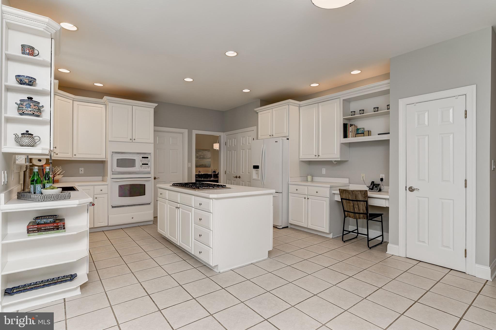 8222 Ventnor Road Pasadena, MD 21122 - Photo 10 of 46 Built-in shelving and desk space