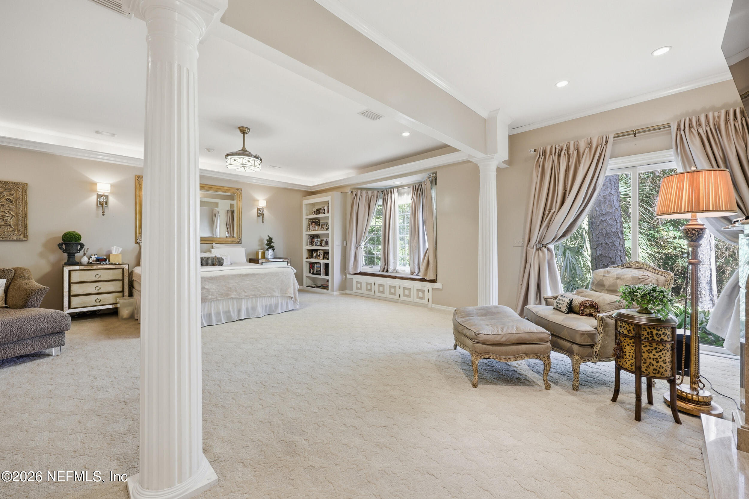 10799 Crosswicks Road Jacksonville, FL 32256 - Photo 16 of 51 a living room with furniture and a large window