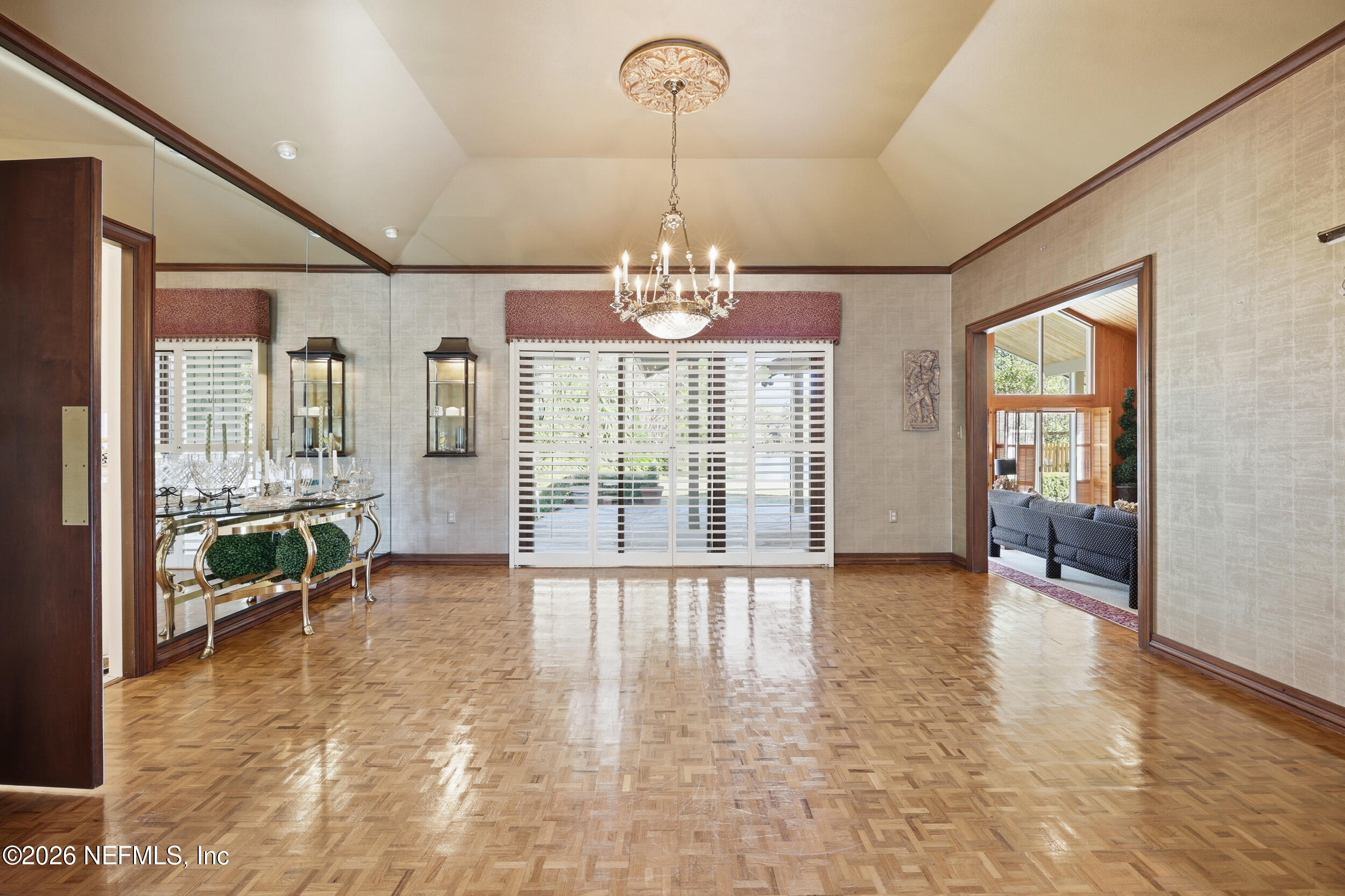 10799 Crosswicks Road Jacksonville, FL 32256 - Photo 21 of 51 a view of an empty room with glass door