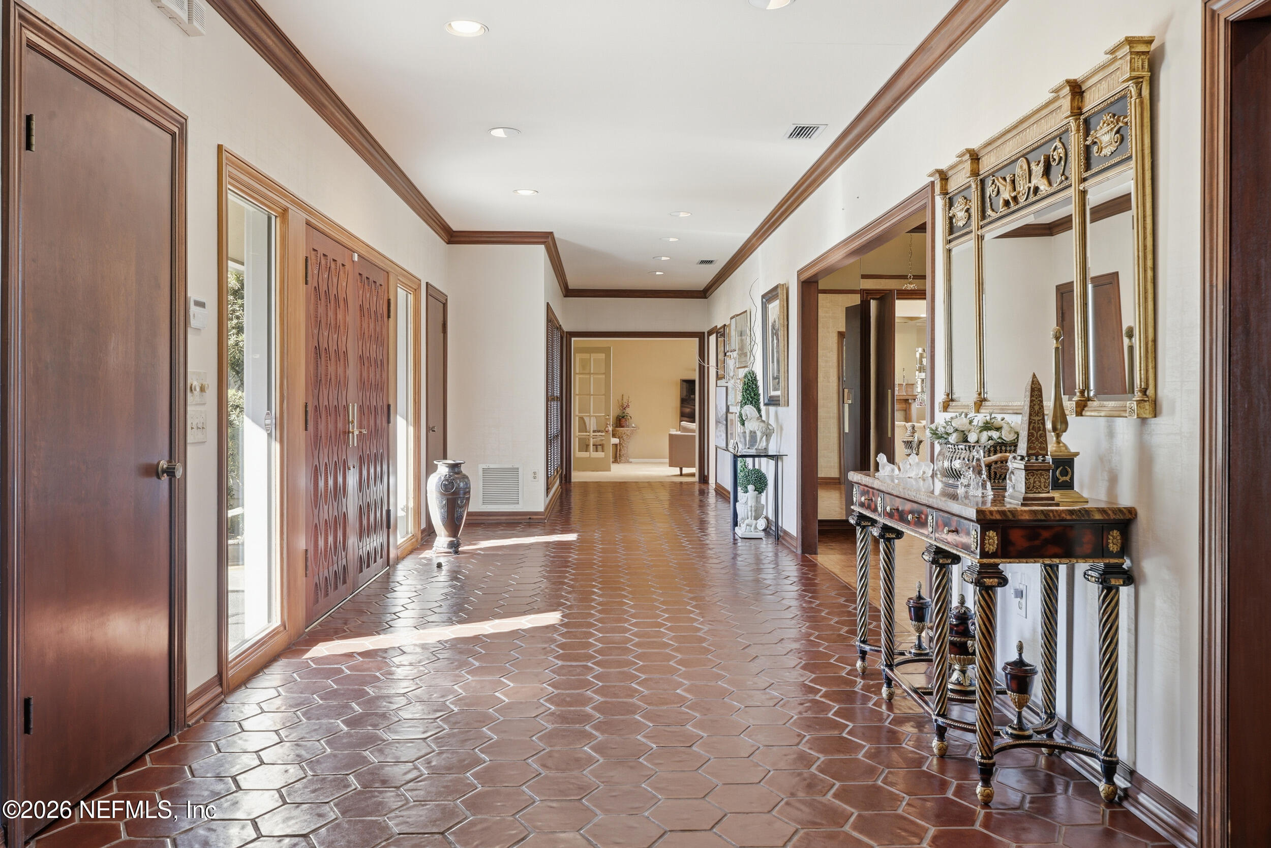 10799 Crosswicks Road Jacksonville, FL 32256 - Photo 38 of 51 a view of an entryway door and hallway with furniture