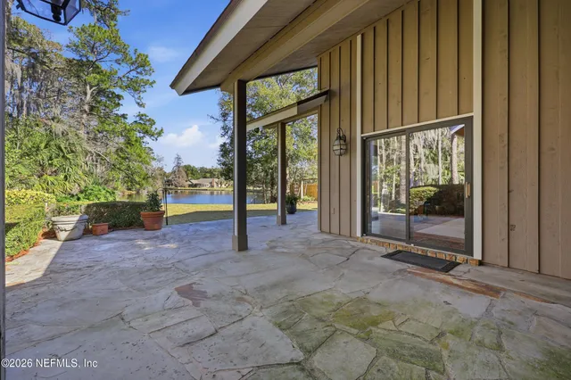 a view of outdoor space with garden and trees