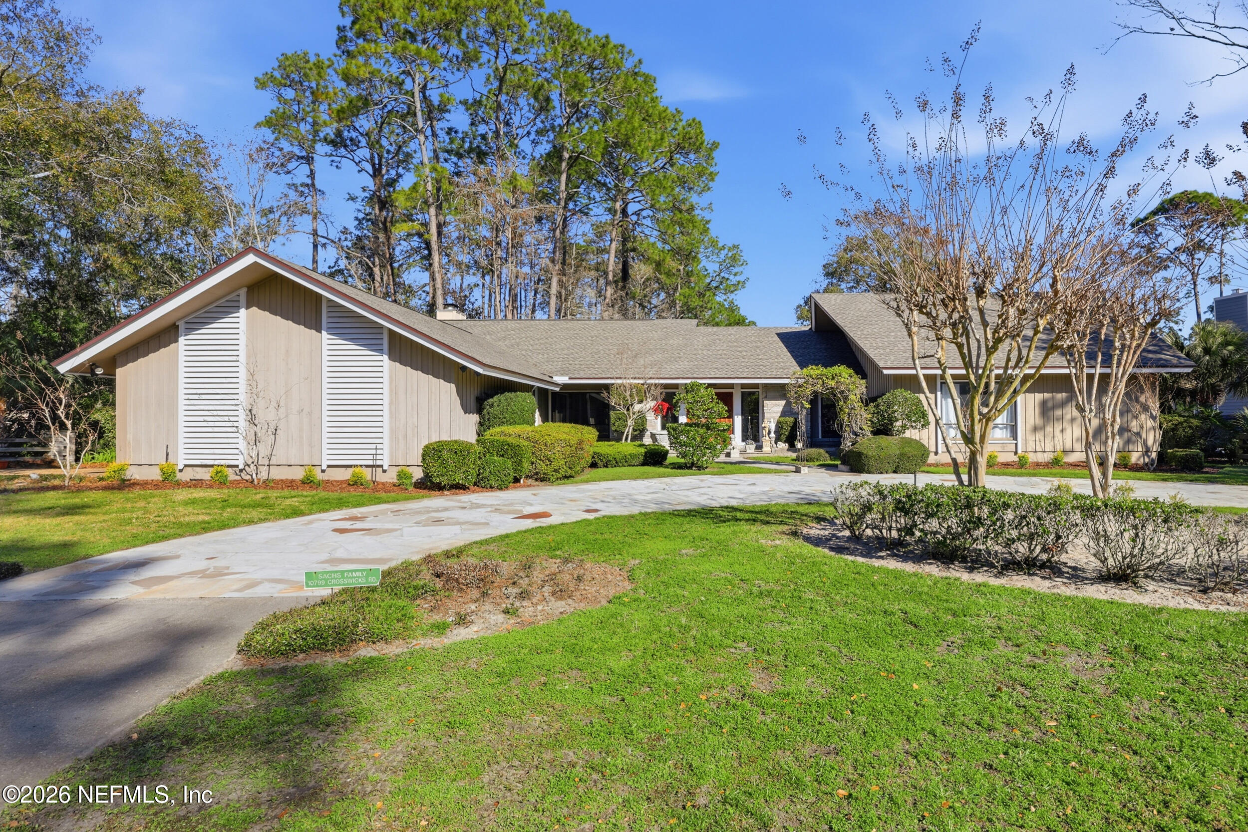 10799 Crosswicks Road Jacksonville, FL 32256 - Photo 43 of 51 a view of a house with a yard