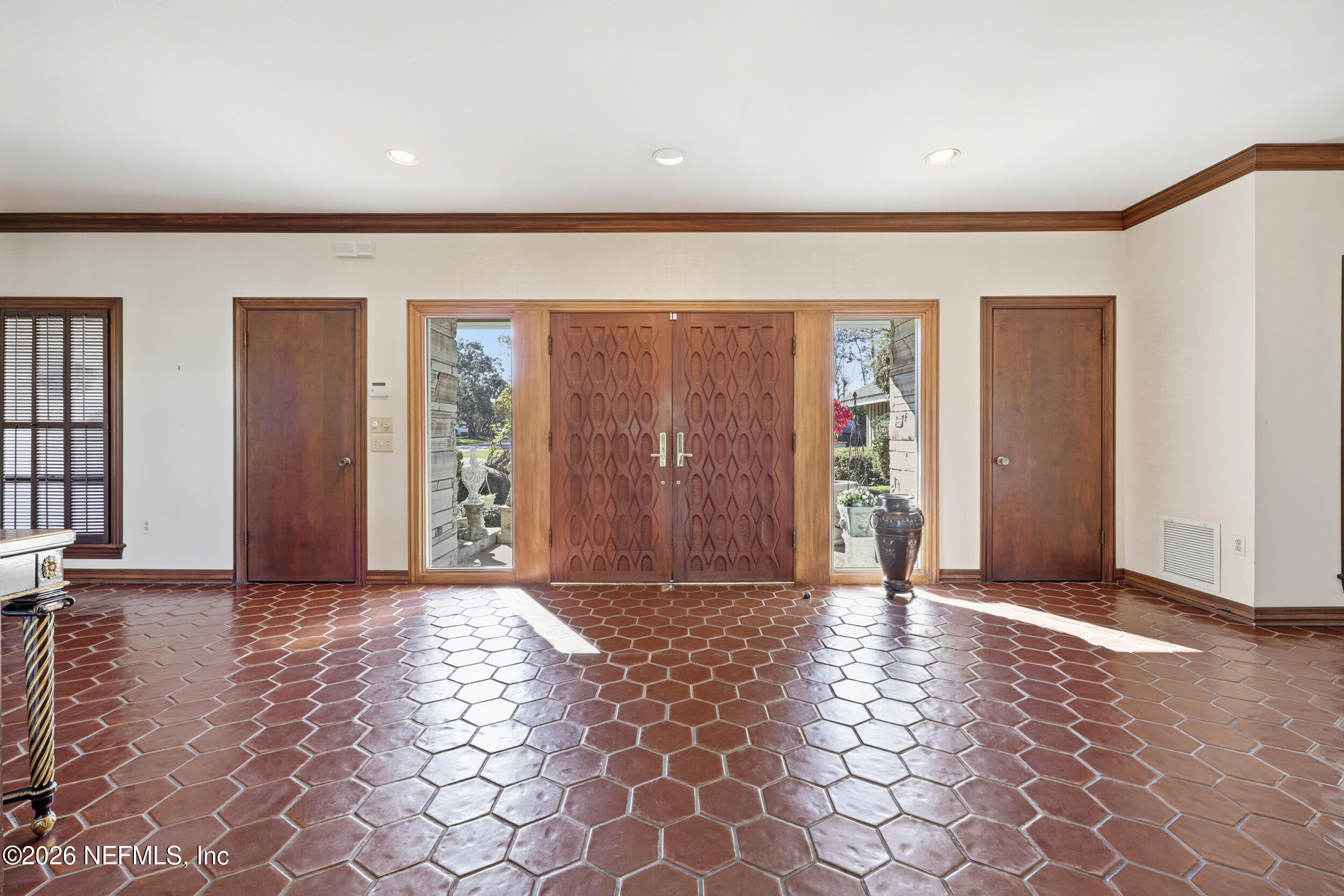 10799 Crosswicks Road Jacksonville, FL 32256 - Photo 50 of 51 an empty room with windows and closet