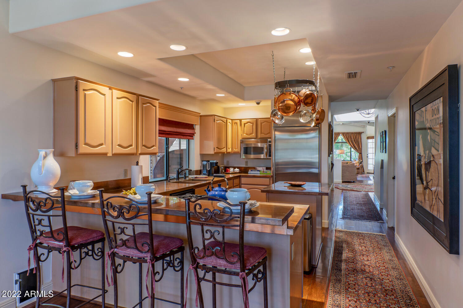 8100 East Camelback Road, Unit 39 Scottsdale, AZ 85251 - Photo 10 of 40 kitchen with breakfast bar