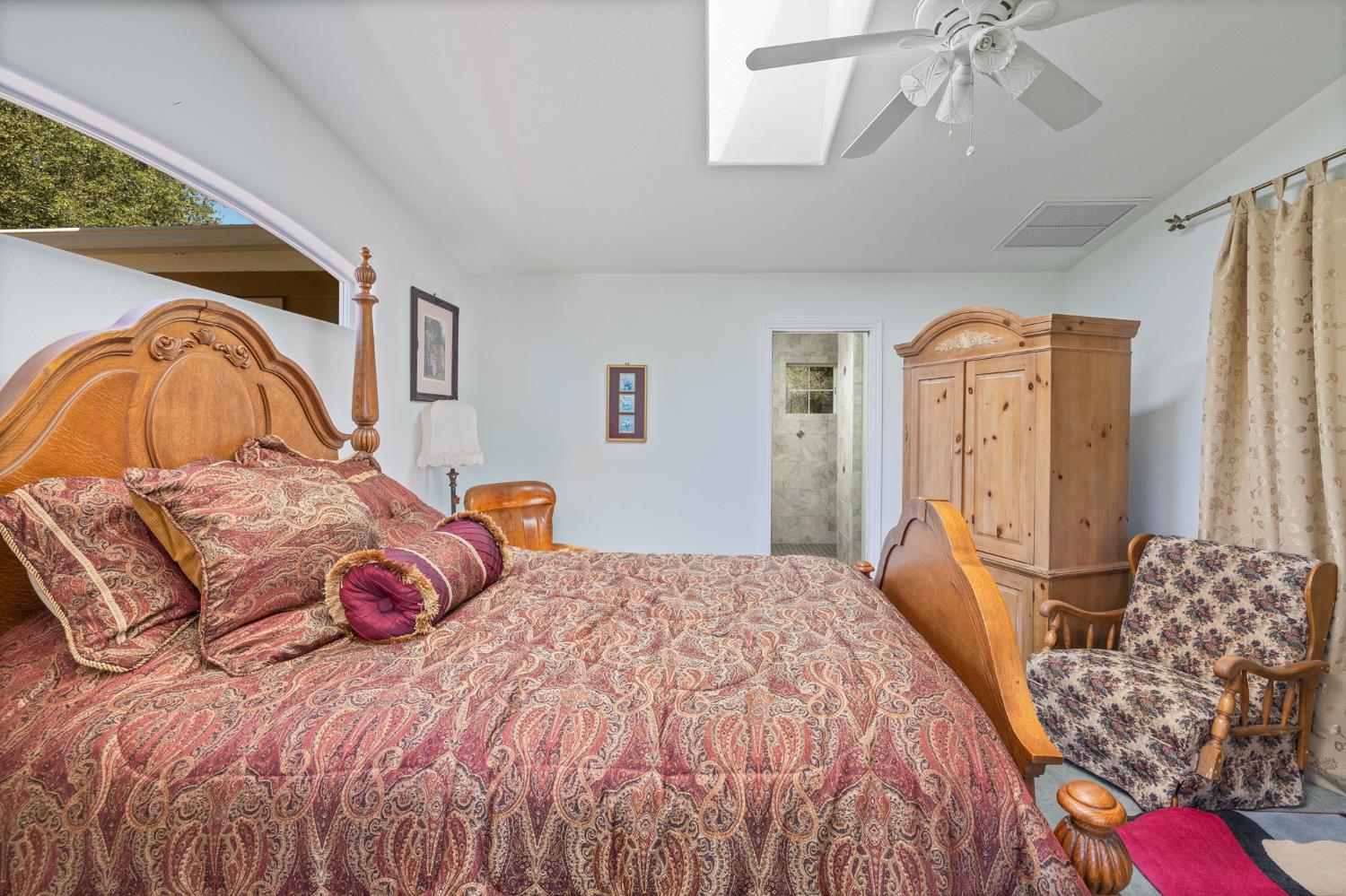 45544 Pine River Road Ahwahnee, CA 93601 - Photo 25 of 75 a bedroom with a bed and wooden floor