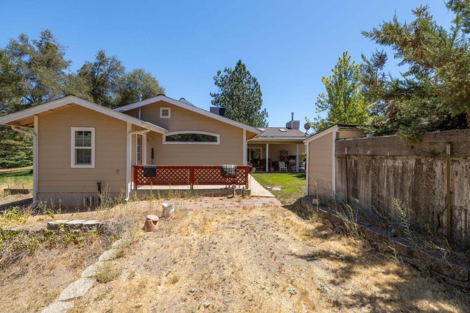45544 Pine River Road Ahwahnee, CA 93601 - Photo 69 of 75 a view of a house with backyard and sitting area