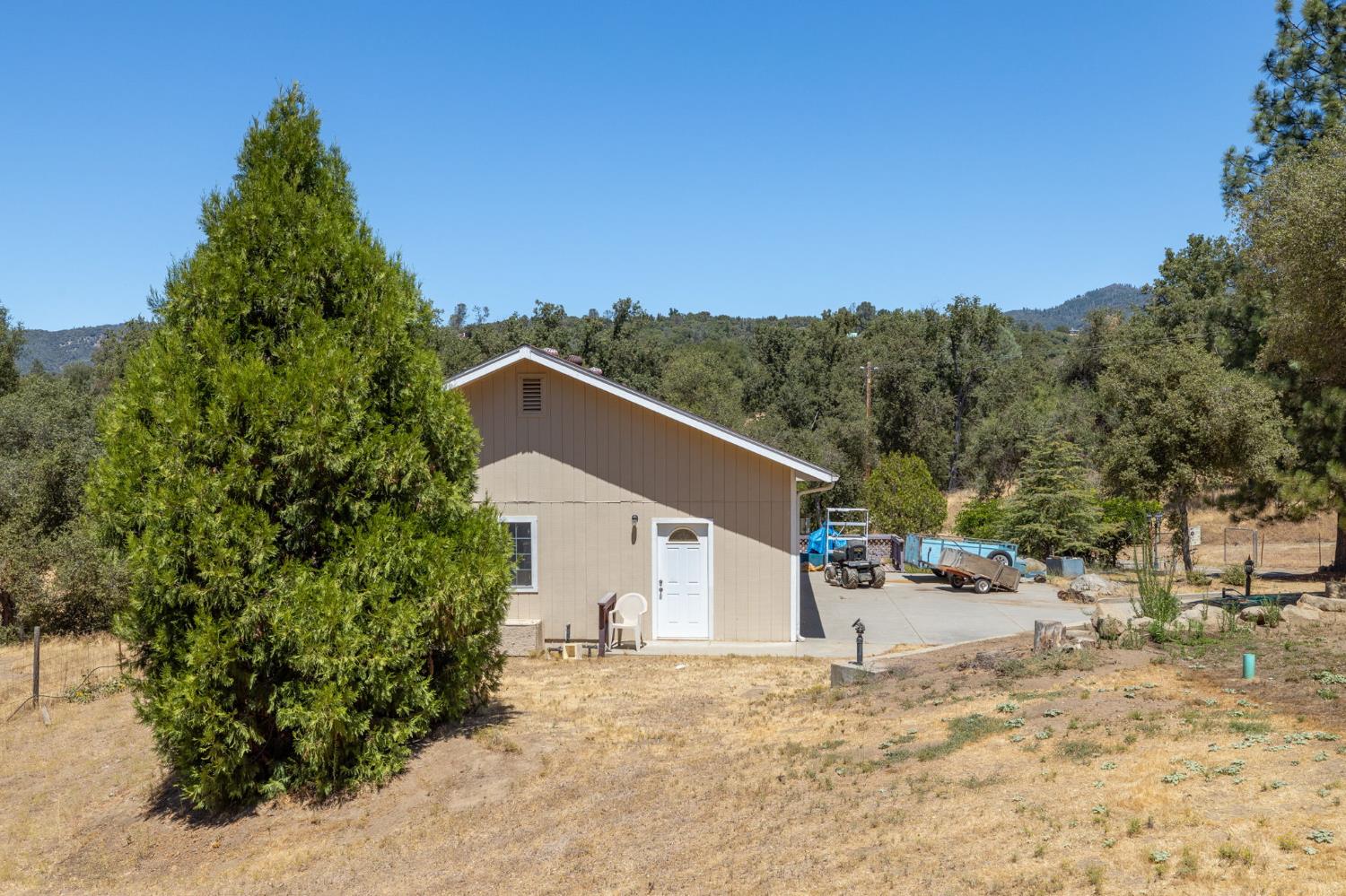 45544 Pine River Road Ahwahnee, CA 93601 - Photo 70 of 75 a view of a house with a snow in the background