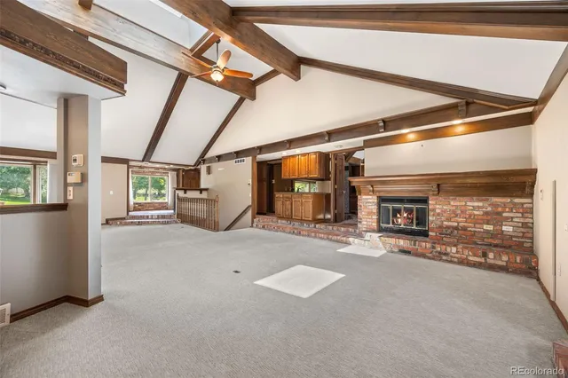 a view of a garage with wooden floors