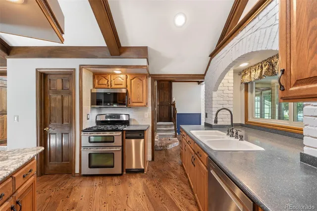a bathroom with a sink and a large window