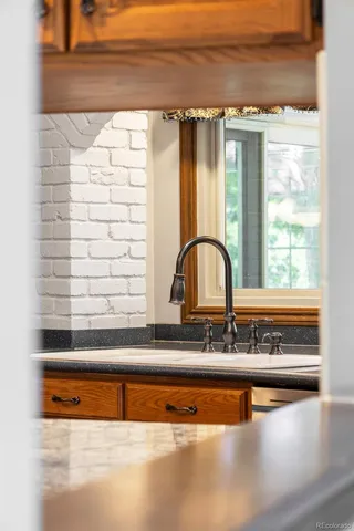 a view of room with window and ceiling fan