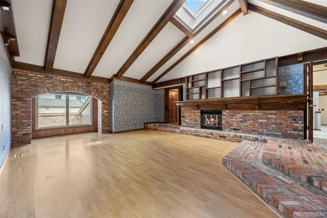 a living room with a fireplace