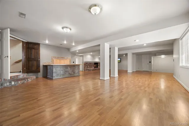 a view of a livingroom with wooden floor