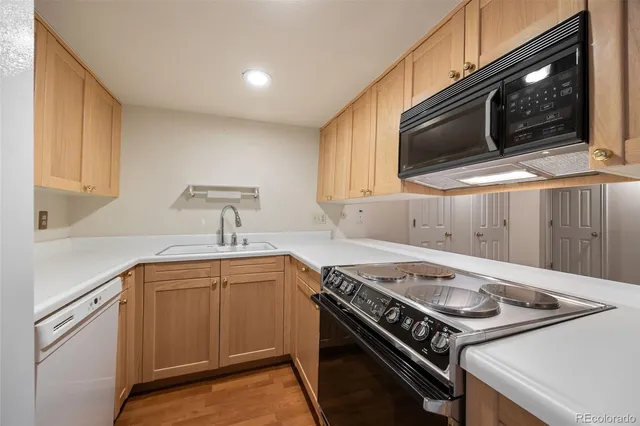 a view of an empty room with windows