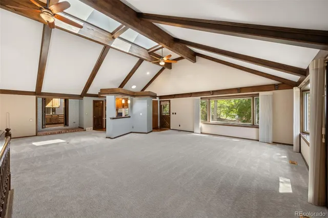 a view of large room with windows