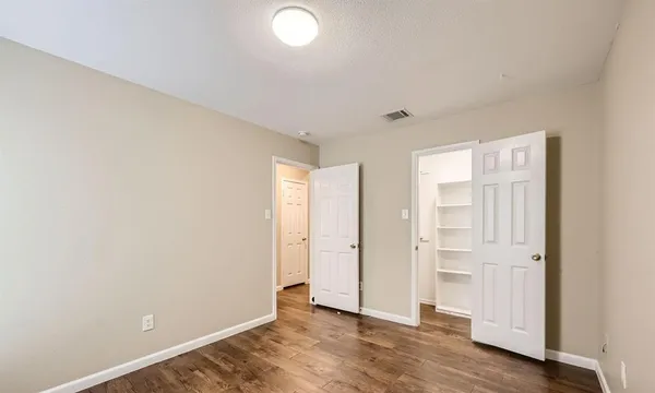 an empty room with closet