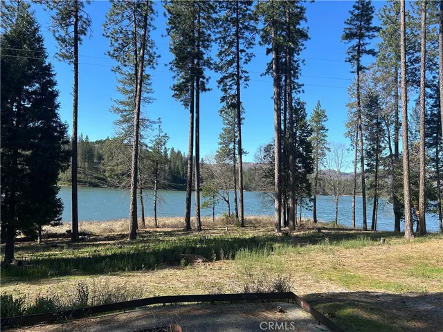 a view of fountain in between the yard