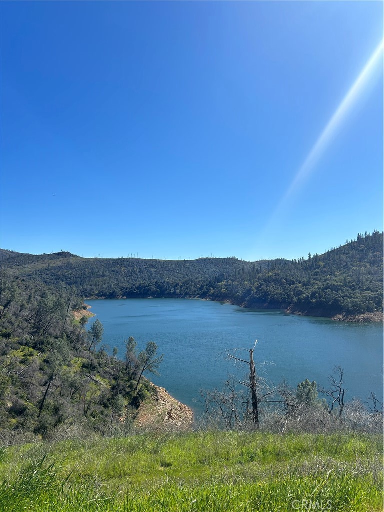 1234 Hog Ranch Road Oroville, CA 95965 - Photo 21 of 21 a view of a lake with mountain in the background