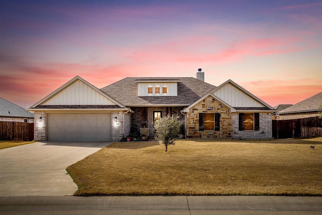 111 Treys Way Godley, TX 76044 - Photo 1 of 38 a front view of a house with a yard