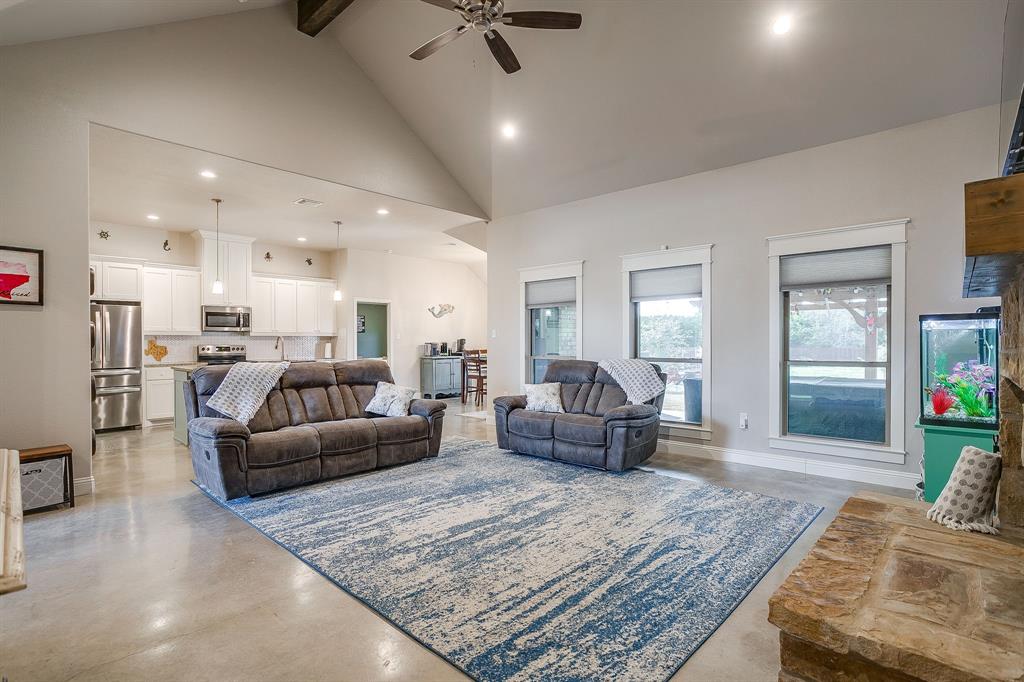 111 Treys Way Godley, TX 76044 - Photo 13 of 38 a living room with furniture and a couch