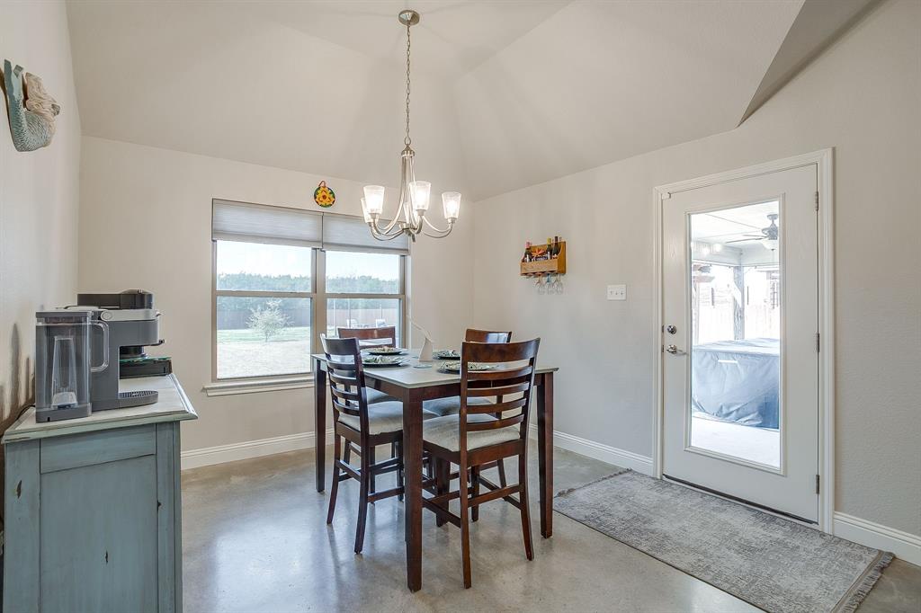 111 Treys Way Godley, TX 76044 - Photo 15 of 38 a view of a dining room with furniture window and outside view