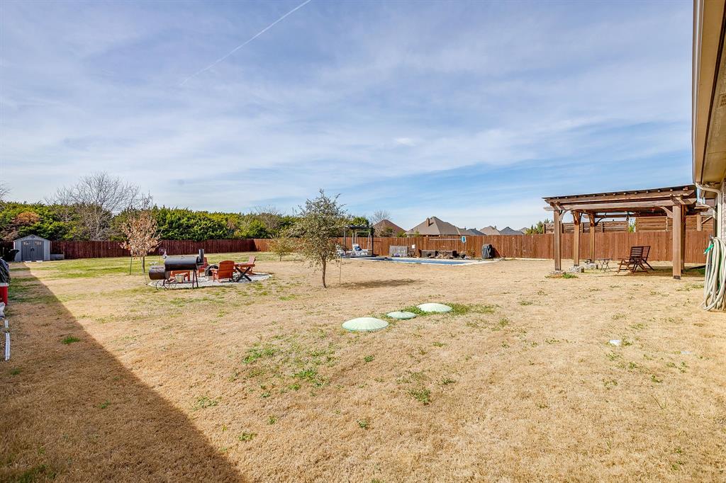 111 Treys Way Godley, TX 76044 - Photo 31 of 38 a view of a swimming pool with an outdoor seating