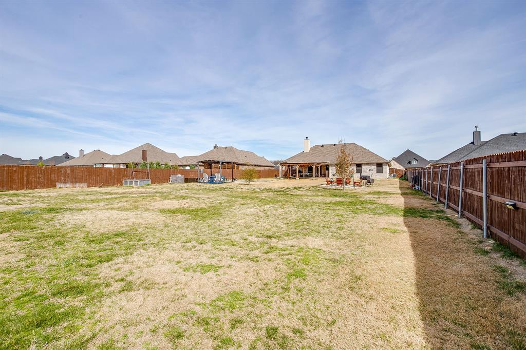 111 Treys Way Godley, TX 76044 - Photo 35 of 38 a view of houses with outdoor space and swimming pool