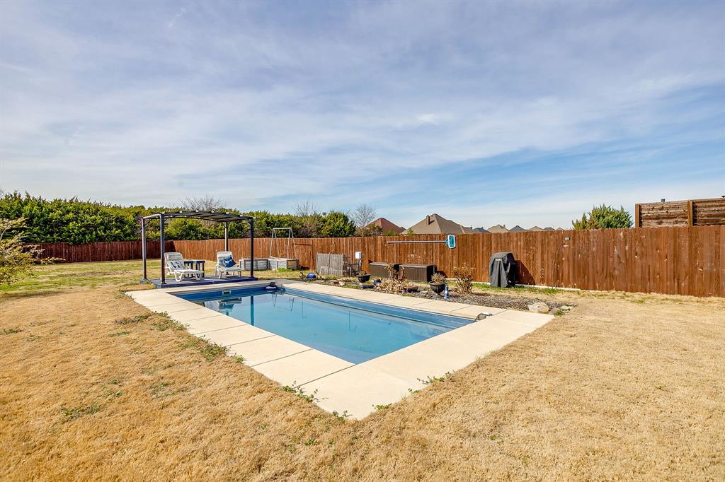 111 Treys Way Godley, TX 76044 - Photo 37 of 38 a view of swimming pool with furniture