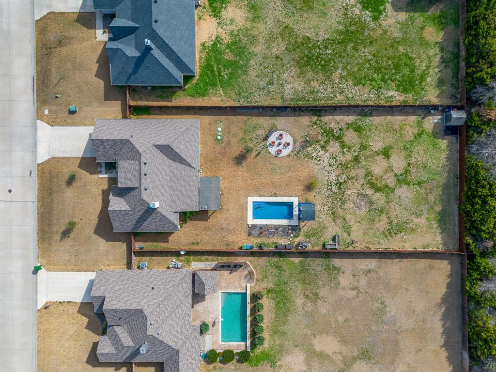 111 Treys Way Godley, TX 76044 - Photo 7 of 38 an aerial view of a house with swimming pool