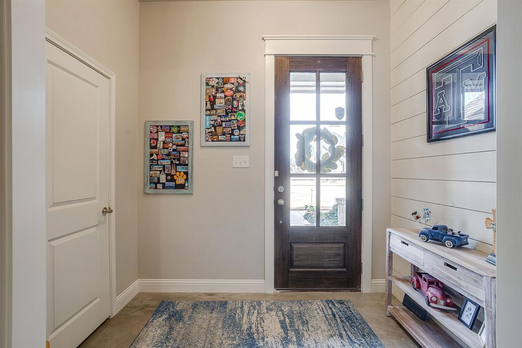 111 Treys Way Godley, TX 76044 - Photo 10 of 38 a bedroom with furniture and a window