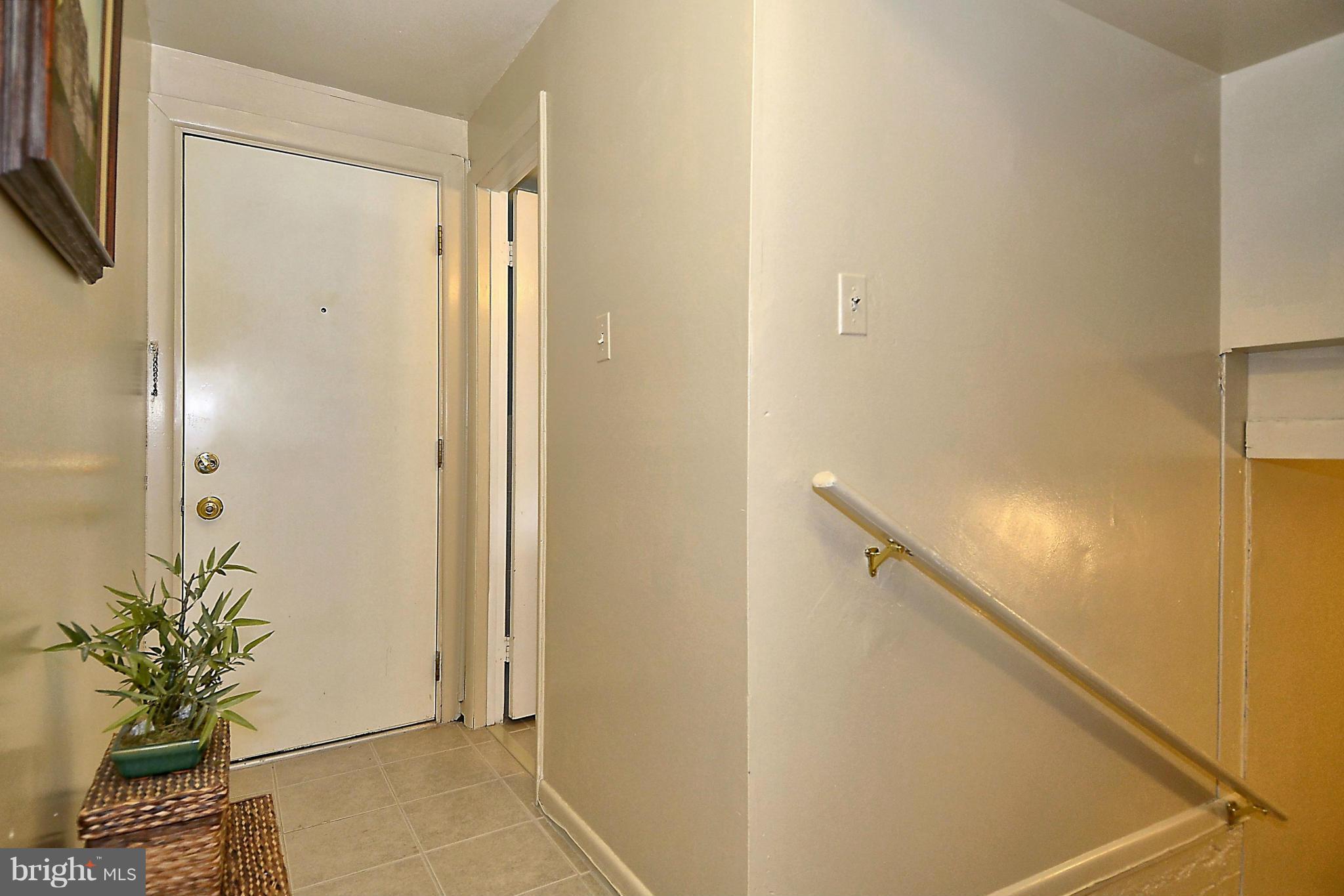 1004 Chiswell Lane Silver Spring, MD 20901 - Photo 23 of 29 Hall leading down to recreation room