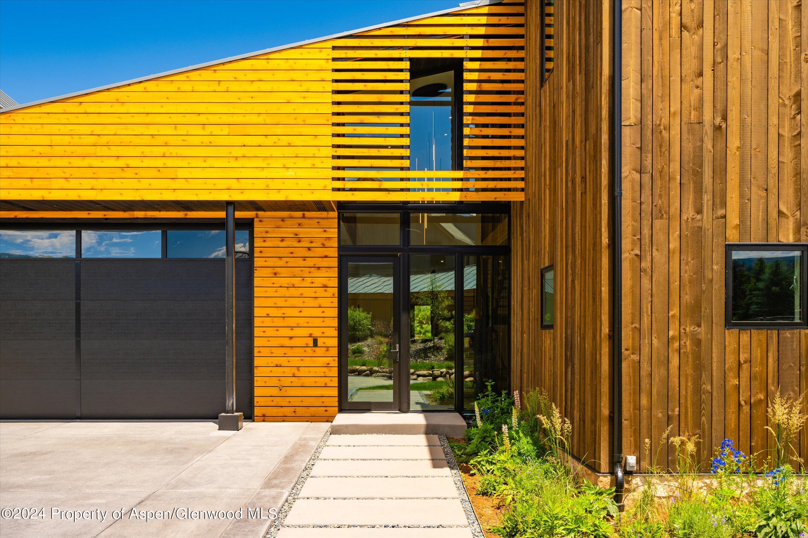 822 Perry Ridge Carbondale, CO 81623 - Photo 2 of 7 a back view of a house with a balcony