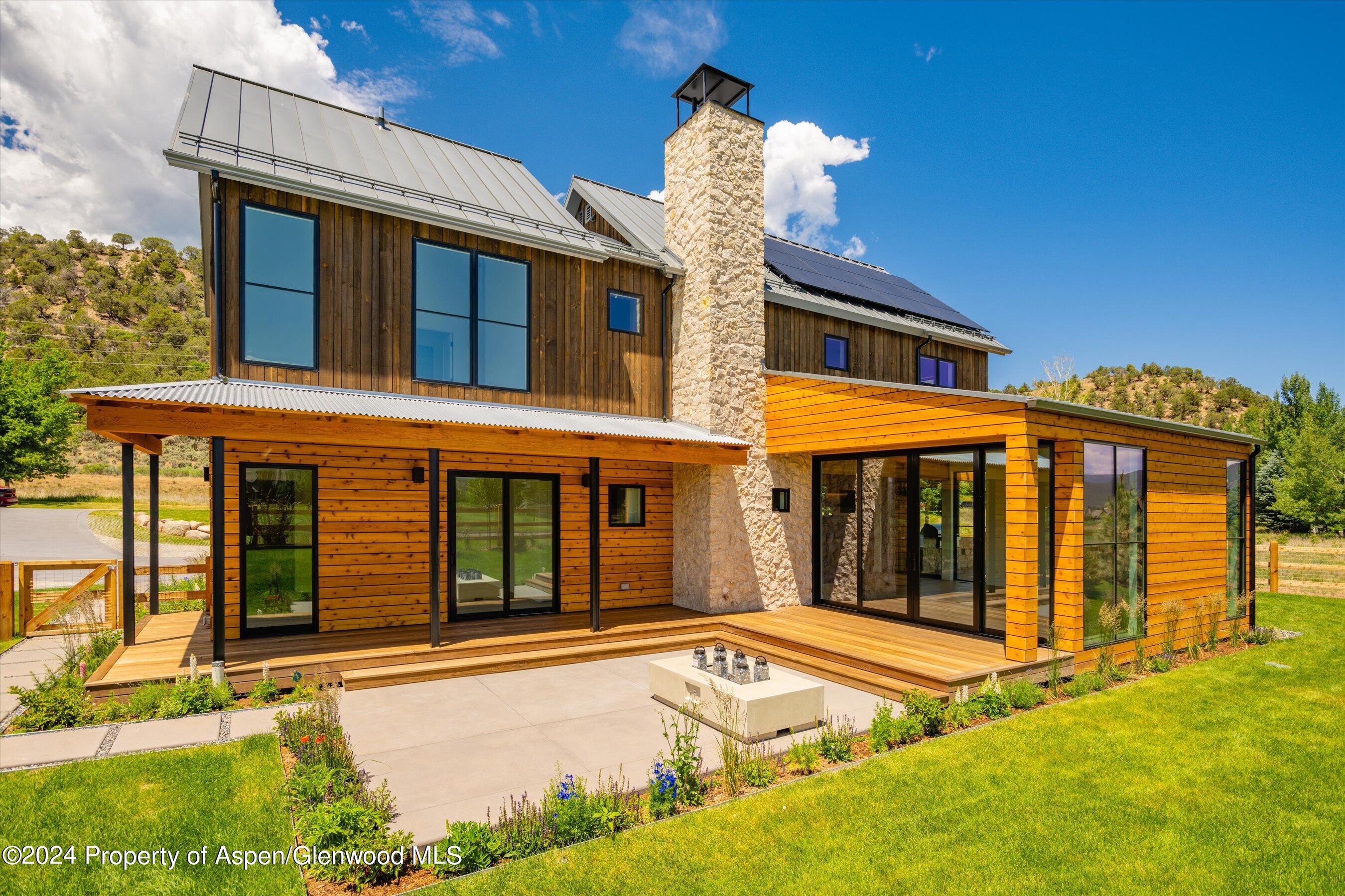 822 Perry Ridge Carbondale, CO 81623 - Photo 4 of 7 a front view of a house with a yard